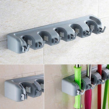 Load image into Gallery viewer, Heavy duty mop broom holder wall mounted garden tool organizer space saving storage rack hanger with 5 position with 6 hooks strong grip holds up to 11 tools for kitchen garden and garage